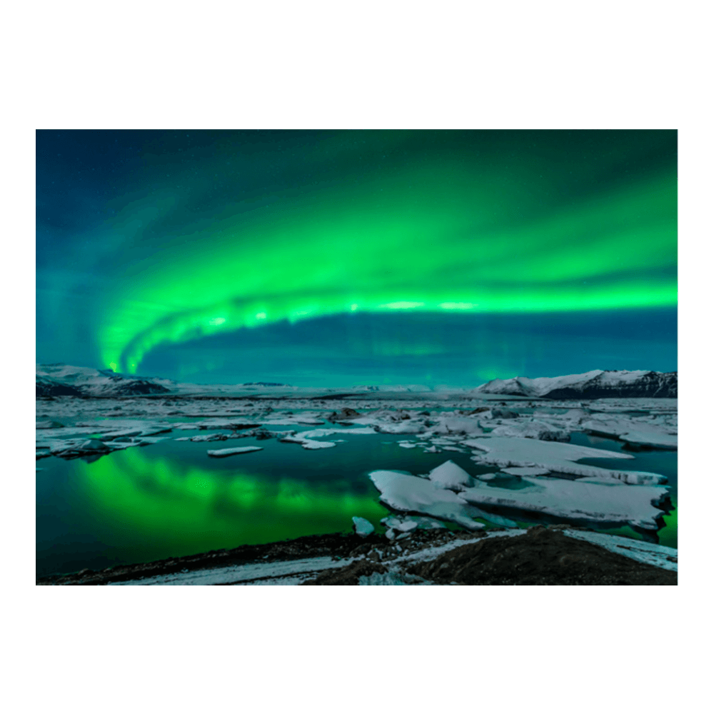 Iceland volcanic peak — a broad volcanic mountain rising against a dramatic Icelandic sky